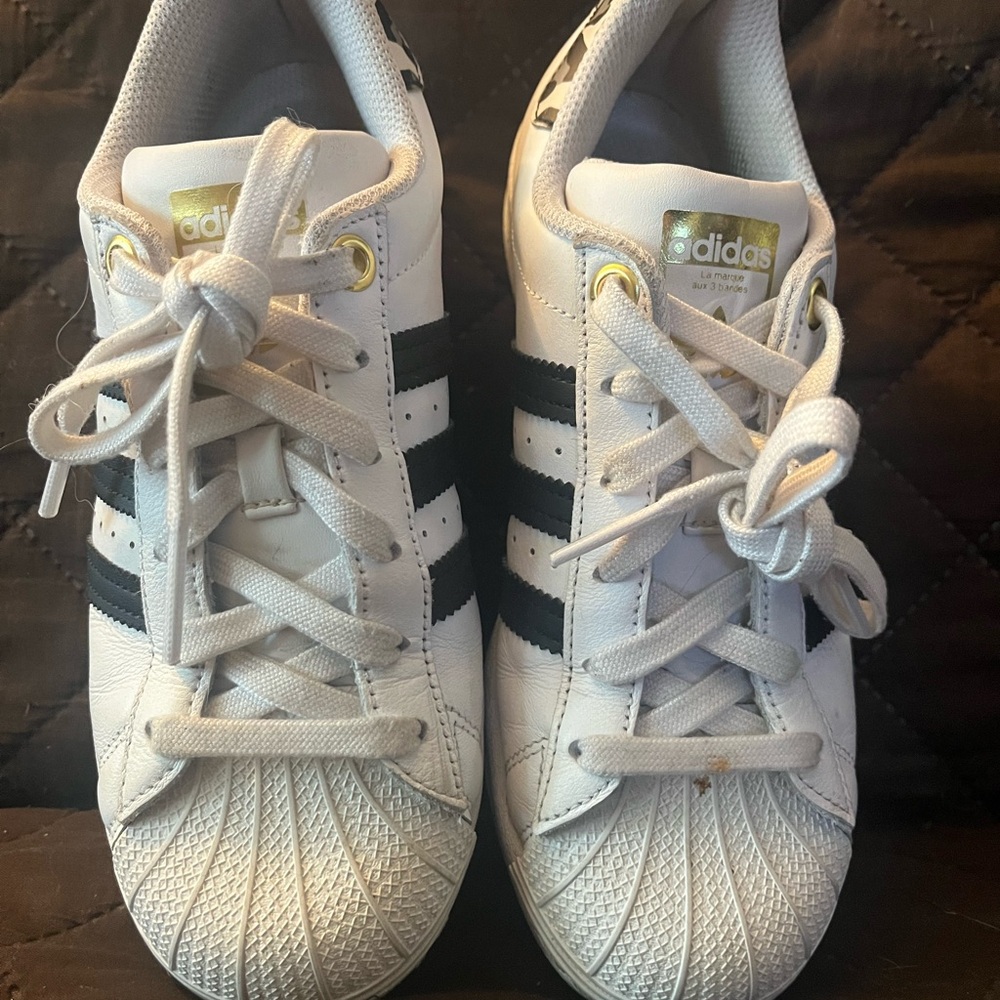 adidas Women's White Sneakers with Black Stripes and Gold Accents